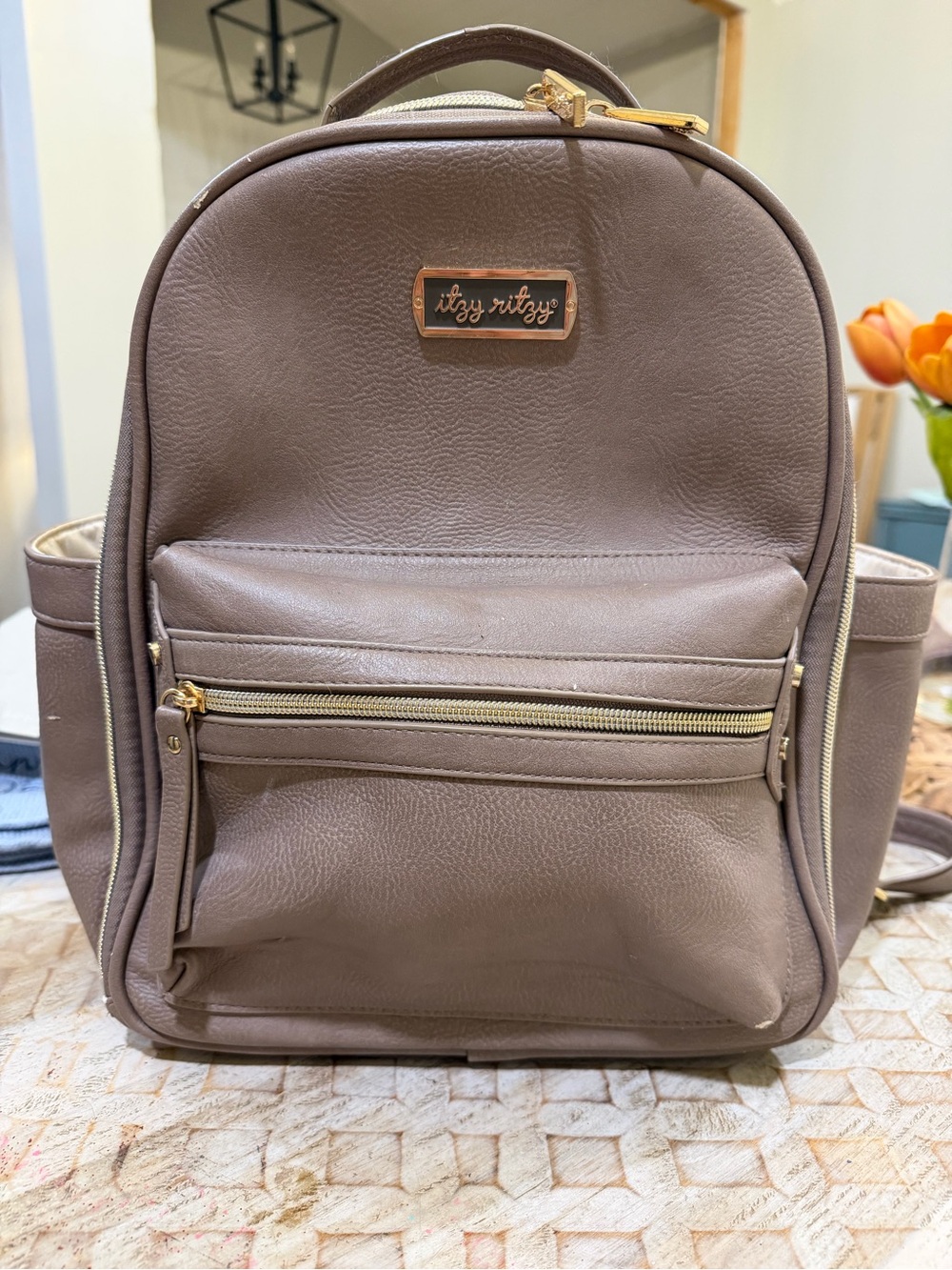 Itzy Ritzy Taupe Faux Leather Bag with Gold Nameplate